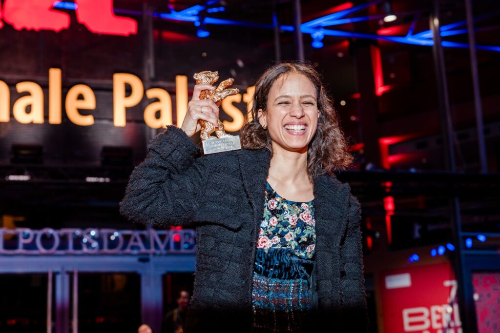 Mati Diop
With the Golden Bear on her shoulder – the director after the Award Ceremony.

Dahomey · Competition · Golden Bear · Feb 24, 2024